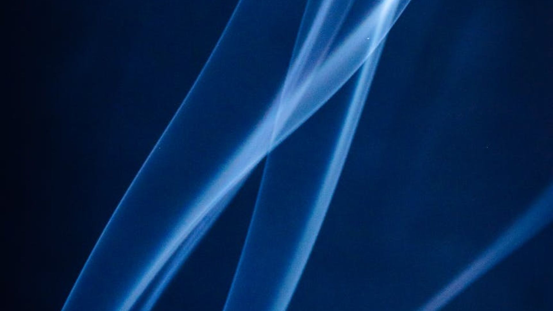 Abstract serene background with flowing lines of light.